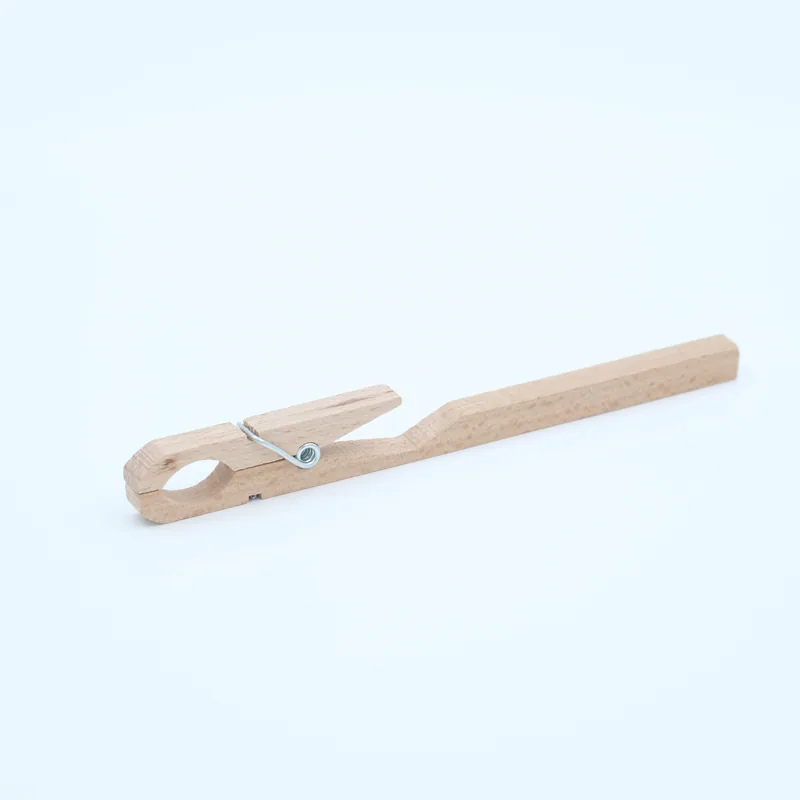 Pince en bois pour Moxa